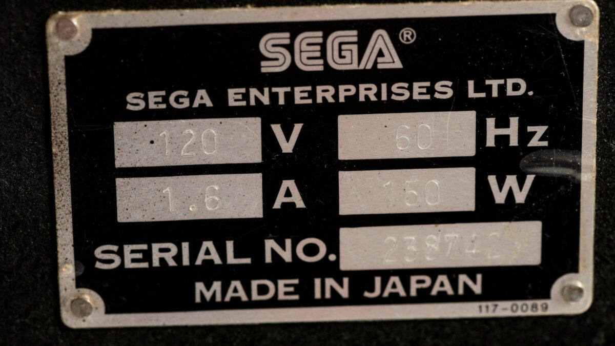 The original serial number and plate for the Super Hang-On machine up for auction